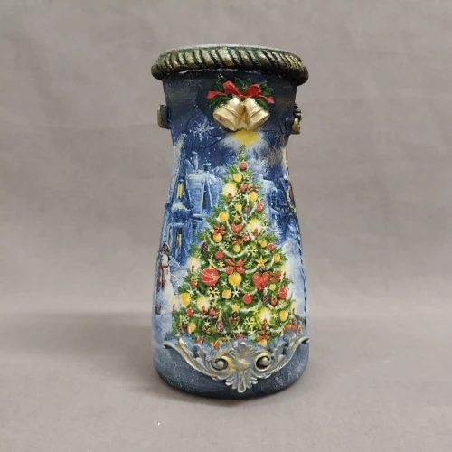 Kolorowy słoik latarenka z motywem świątecznym.